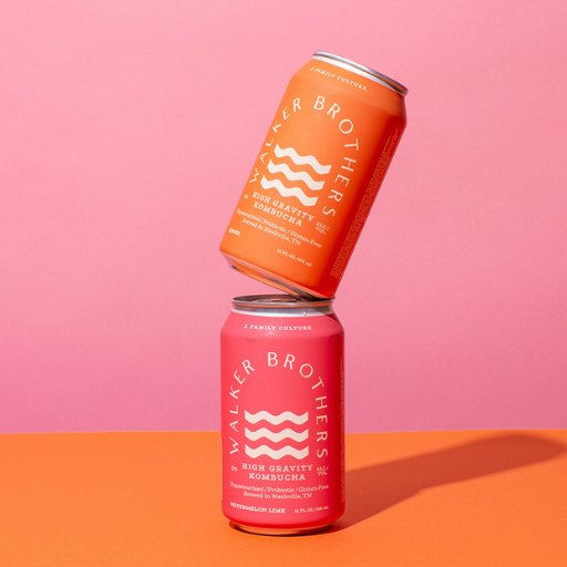 Walker Brothers High Gravity Ginger can stacked on Watermelon Lime can with a pink and orange background