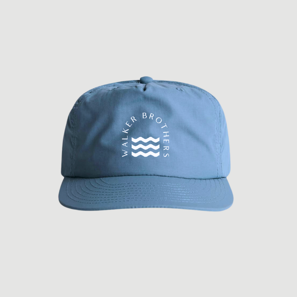 Light blue surf cap with a white Walker Brothers logo