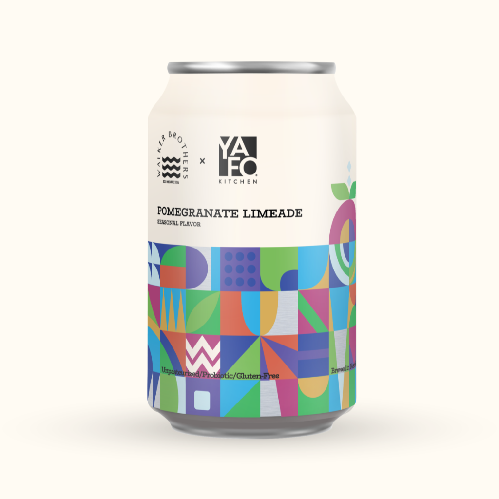A can of Pomegranate Limeade from Walker Brothers and Yafo Kitchen, featuring a colorful geometric design and labels indicating it is a seasonal flavor and gluten-free.